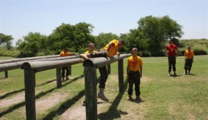 a low hurdle log obstacle on the Marine Corps obstacle course