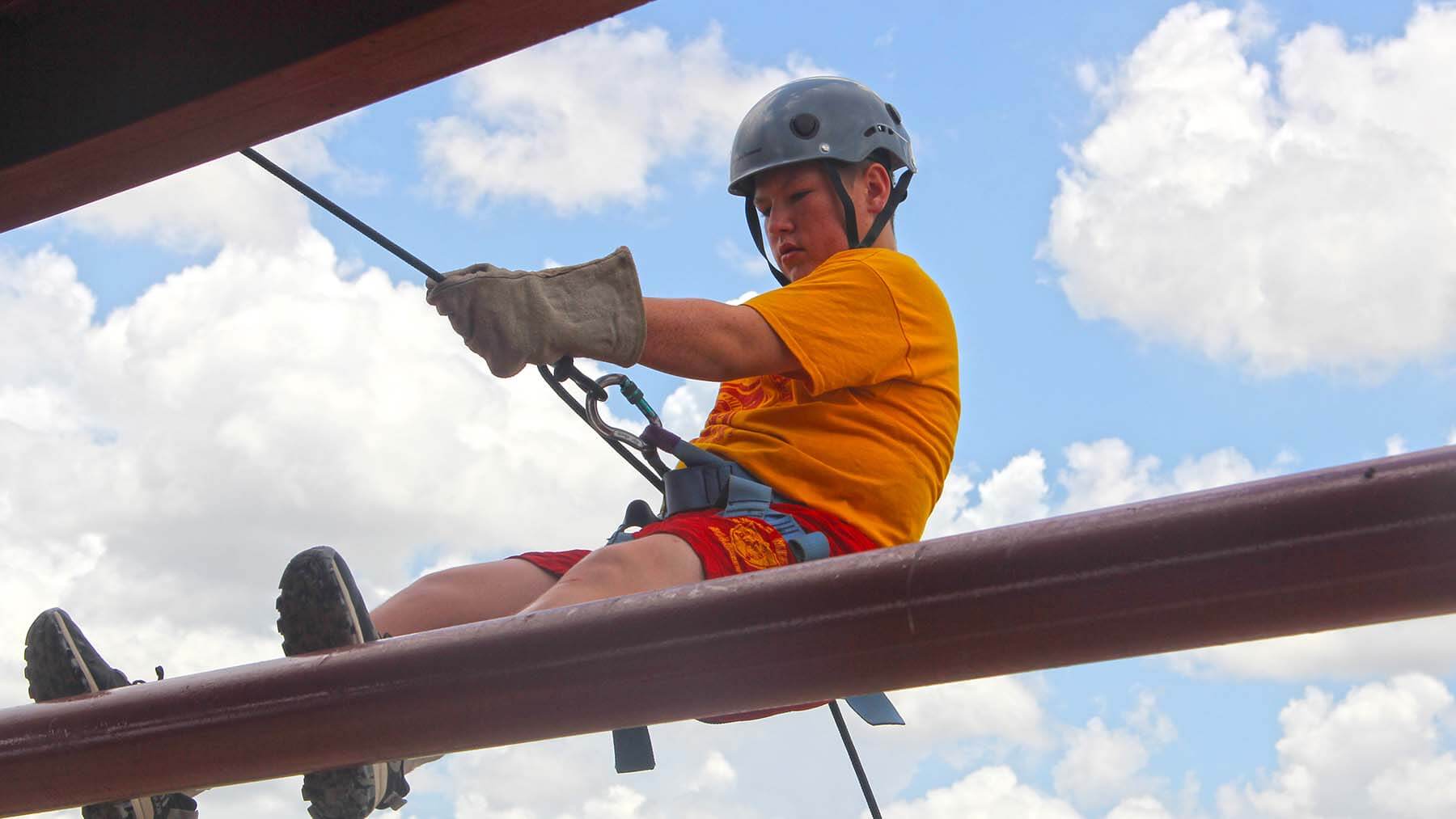 Rappeling at MMA's military summer camp