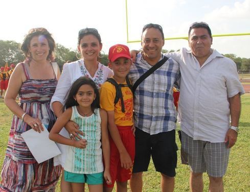 camper and family at summer camp graduation